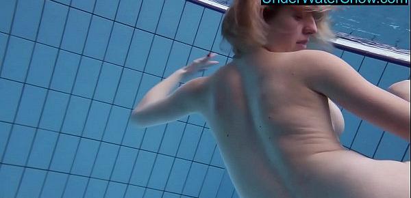 Hot blondie in stockings swims